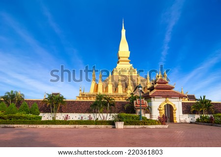 Stockfoto: Buddhist Pagoda Of Phra That Luang Temple Under Blue Sky Vientiane Laos