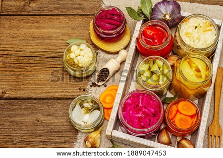 Stok fotoğraf: Zucchini Preserve In Glass Jar On A Wooden Table Homemade Canning Winter Preserve