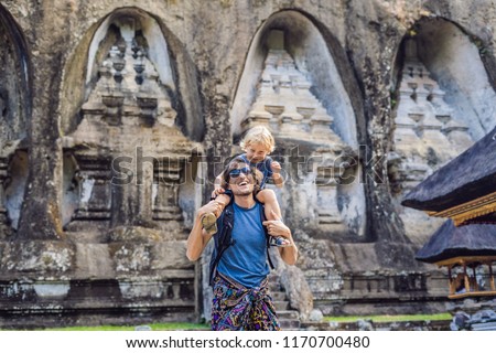 Zdjęcia stock: Dad And Son On Background Of Gunung Kawi Ancient Carved In The Stone Temple With Royal Tombs Bali