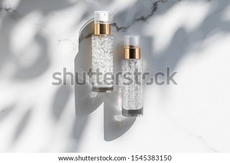 Stock photo: Holiday Make Up Base Gel Serum Emulsion Lotion Bottle And Rose