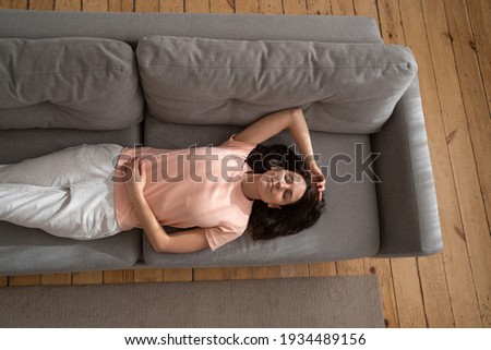 Stock photo: Day Dreaming - Caucasian American Female Relaxed At Home Having