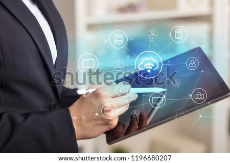 Stockfoto: Hand Using Tablet With Network Security And Online Storage System Concept