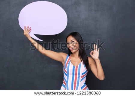 Foto stock: Image Of Beautiful Asian Woman 30s Holding Blank Thought Bubble