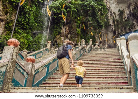 Сток-фото: Father And Son In The Background Of Batu Caves Near Kuala Lumpur Malaysia Traveling With Children