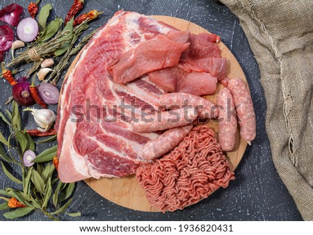 Сток-фото: Steak Pork Grill On Wooden Cutting Board With A Variety Of Grilled Vegetables
