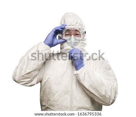 Stock photo: Chinese Man Wearing Hazmat Suit Goggles And Gas Mask With Brick