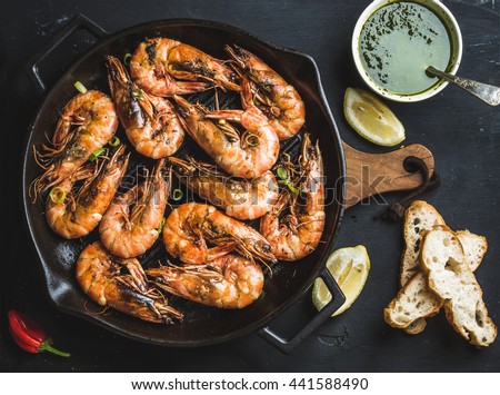 Stock fotó: Roasted Tiger Prawns On Iron Grilling Pan With Fresh Persley Lemon Chilli And Bread