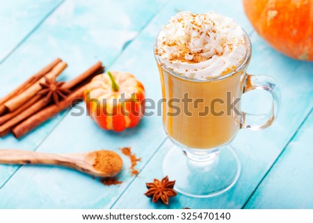 [[stock_photo]]: Pumpkin Smoothie Spice Latte With Whipped Cream Turquoise Wooden Background