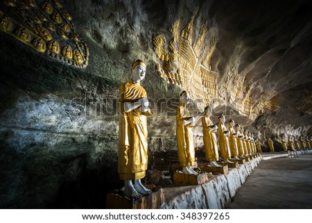[[stock_photo]]: Buddhas Statues And Religious Carving At Sadan Sin Min Cavehpa An Myanmar