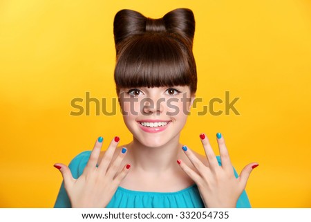 Stok fotoğraf: Beautiful Smiling Teen Girl With Bow Hairstyle Makeup And Colou