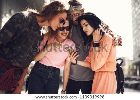 Stok fotoğraf: Group Of Friends Interacting With Each Other