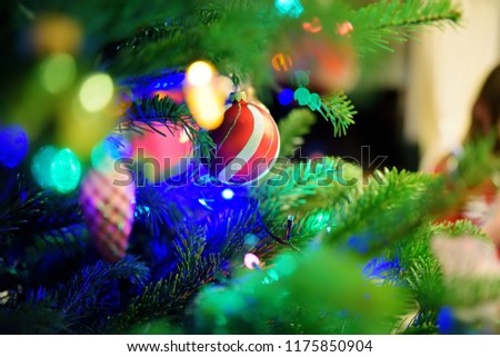 Foto d'archivio: Christmas Tree Spruce Baubles Colorful Saturated Home Concept