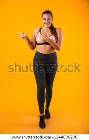 Foto stock: Full Length Portrait Of Overweight Sportswoman In Sportive Bra S