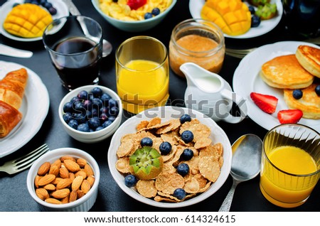 Сток-фото: Breakfast Table Setting With Fresh Fruits Pancakes Coffee Cro
