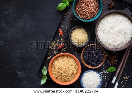 Сток-фото: Black Bowl Of Raw Organic Arborio Risotto Rice On White Background Healthy Food