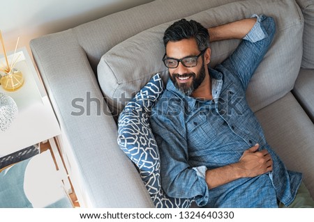 Stockfoto: A Handsome Middle Age Hispanic Latin Man In A Top Of A In Mountain Hiking