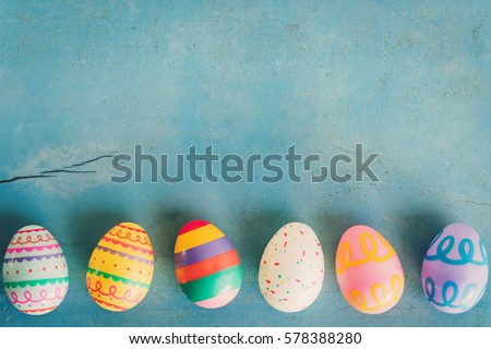 Stockfoto: Pastel Background With Multicolored Eggs And Flowers To Celebrat