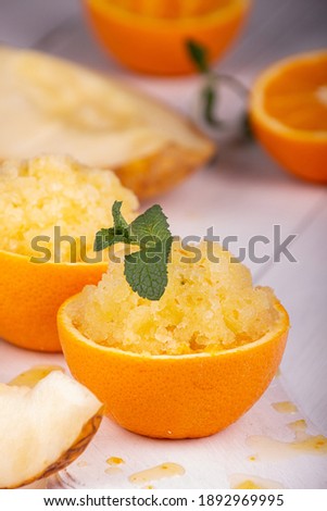 ストックフォト: Fresh Yellow Melon In Half Over White Background