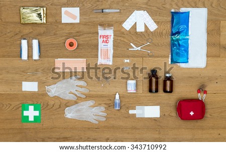 ストックフォト: Array Of First Aid Kit Objects On Wooden Surface With Copyspace