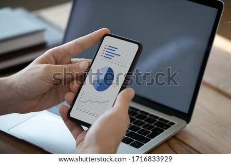 Foto d'archivio: Close Up Of Smartphone With Email App Interface On Screen Holding In Mans Hand