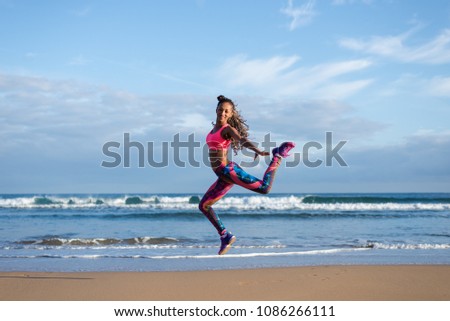 Zdjęcia stock: Sporty Brazilian Woman Dancing And Having Fun At The Beach Black Happy Dancer Enjoying Music Rhythm