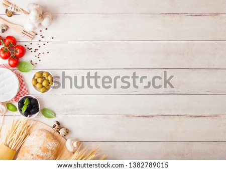 ストックフォト: Homemade Spaghetti Pasta With Quail Eggs With Bottle Of Tomato Sauce And Cheese On Wooden Background