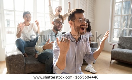 Stock fotó: Young Multicultural Group Of Fans Watching Broadcast Of Sports Match