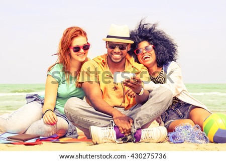 Foto stock: Man And Woman Tourists Have Fun On The Beach Watching The Landing Planes Traveling On An Airplane C