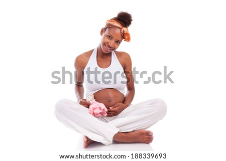 Foto stock: Young Pregnant Indian Woman Holding A Plush