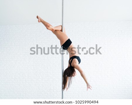 Foto d'archivio: Young Slim Pole Dance Woman Performer Isolated On White Backgr