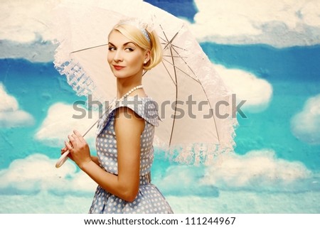 ストックフォト: Blond Coquette Pin Up Style Young Woman In Blue Dress With Vintage Camera