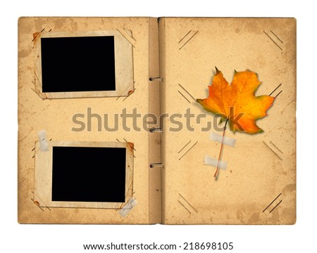 Stok fotoğraf: Open Vintage Photoalbum For Photos With Autumn Foliage On White