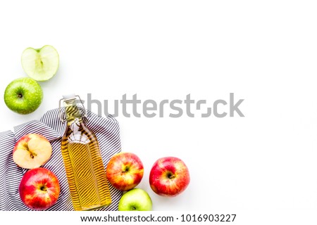 Foto stock: Glass Of Homemade Organic Apple Cider With Fresh Apples In Box On Wooden Background With Sun Light