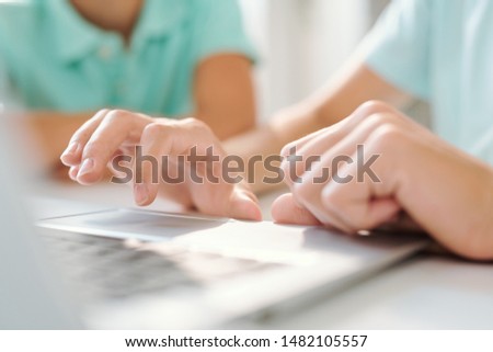 Hand Of Young Woman Or Teenage Girl Over Keypad Of Laptop During Network Foto stock © Pressmaster