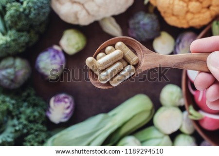 Foto stock: Red Pills For Healthy Diet Nutrition Supplements Pill And Probi