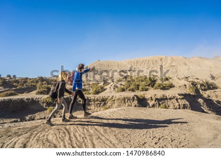 Stock foto: Young Couple Man And Woman Visit The Bromo Volcano At The Tengger Semeru National Park On Java Islan