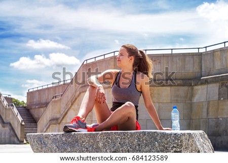 Athlete Woman Standing After Sport Exercising On The Rocks By Th ストックフォト © Wisiel