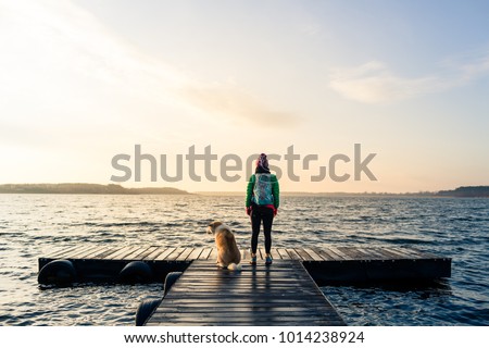 Foto stock: Hiking Woman With Backpack Looking At Inspirational Autumn Golde