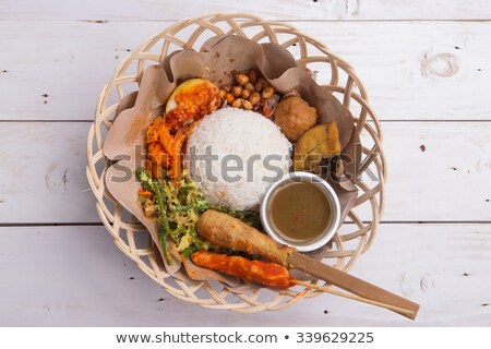 Stock fotó: Nasi Lemak Nasi Campur Indonesian Balinese Rice With Potato Fritter Sate Lilit Fried Tofu Spicy