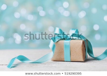 ストックフォト: Christmas Present Against Blue Background