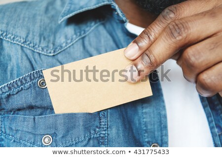 Stock fotó: Businessman Pulling A Business Card Out Of His Pocket