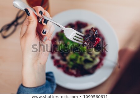 Stockfoto: Woman Eating Lettuce Raspberry Salad