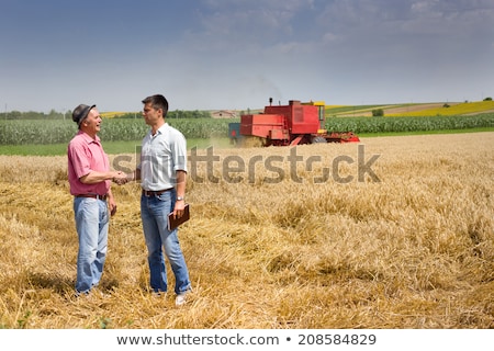 Foto stock: Plant In Hands Of Agricultural Worker