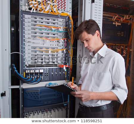 Foto d'archivio: Businessman With Hands Tied In Network Cable