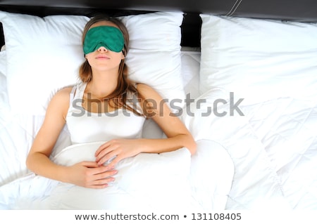 Сток-фото: Closeup Portrait Of A Beautiful Young Woman Sleeping On The Bed