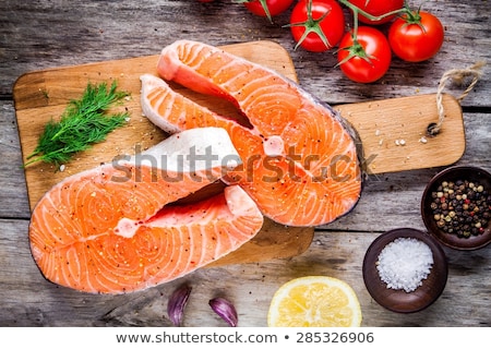 Foto stock: Raw Salmon Fish Steak On Wooden Rustic Background