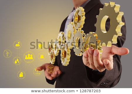 Stock fotó: Golden Cog Gears With Industry Building Concept 3d