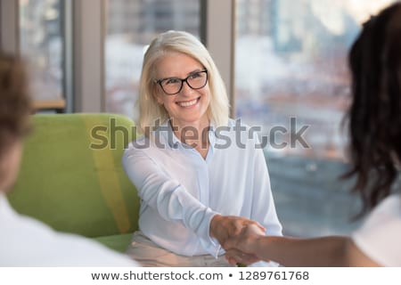 Stock photo: Older Business Woman Shaking Hands