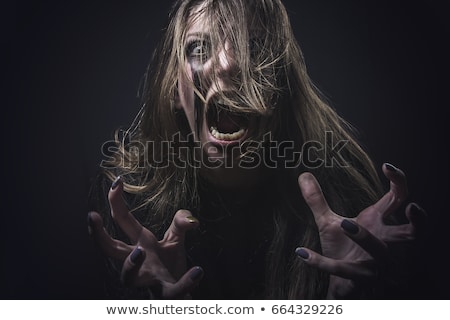 Stock fotó: The Woman Screams In Horror