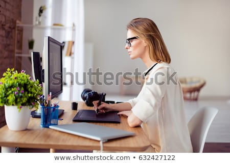 Foto stock: Photographer At Work With Computer Graphics
